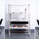 Illustration for article titled The Perfect Family Work Surface: Three Desks, One Shelving Unit